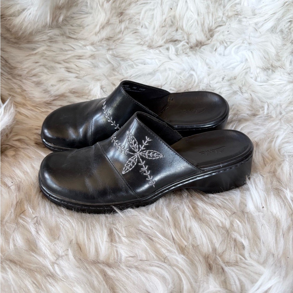 Black Embroidered Clarks Slip Ons